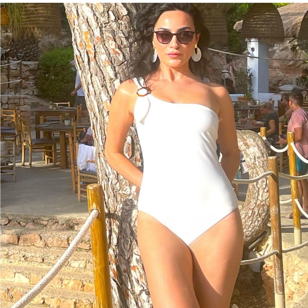 ZIMMERMANN
buckle-detail one-shoulder swimsuit $470++